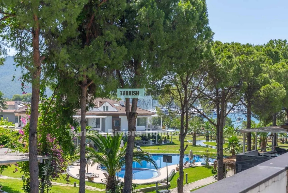 Imagine mornings filled with sea breezes and sunlight streaming through your windows, afternoons spent by the pool or exploring idyllic coves, and evenings dining on your balcony as sailboats drift past the horizon.